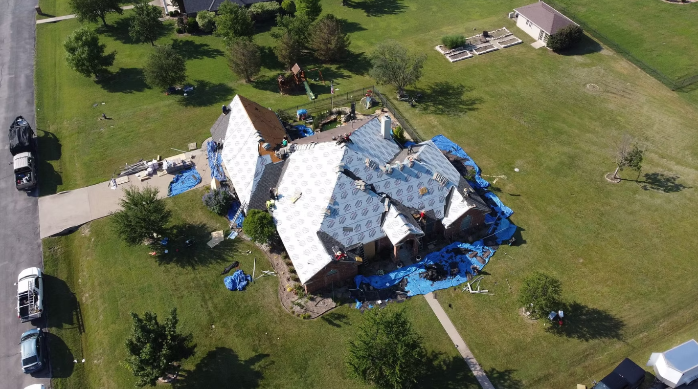 storm damaged roof paid for by insurance lombard IL
